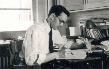 Thomas M. Devlin as undergraduate student at his desk